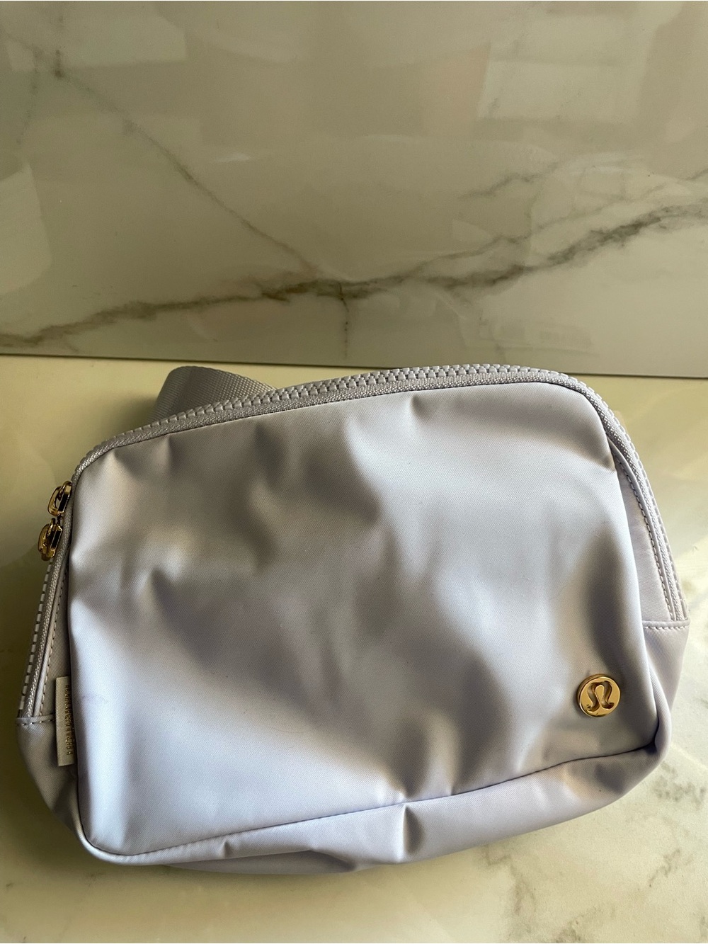 lululemon athletica Light Gray Cosmetic Pouch with Gold Logo